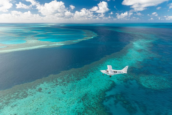 Great Barrier Reef Scenic Flight And Ocean Rafting Whitehaven Beach Day Trip - Accommodation Australia